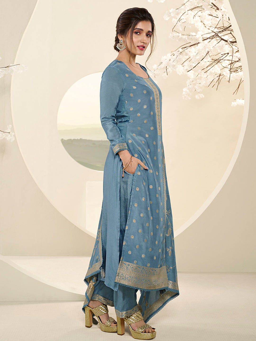 Sky Blue Muslin Jacquard Kurta Suit Set with Champagne Thread Weave and Pencil Sketch Weave Yoke by Qivii