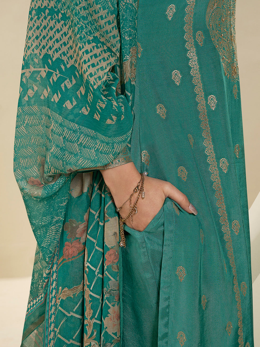 Viridian Green Muslin Jacquard Kurta . Paired with Santoon Straight pants and Muslin Jacquard Abstract Digital Print Dupatta