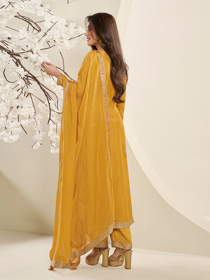 Amber Yellow Muslin Jacquard Kurta Suit Set by Qivii