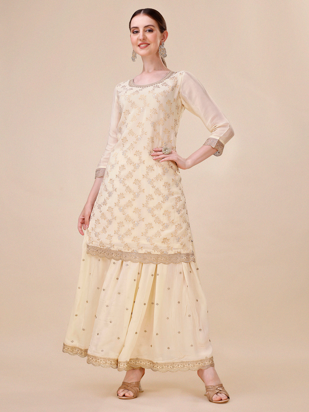 Off-White Chinon Kurta. Paired with Chinon Sharara Bottom and Chinon Dupatta