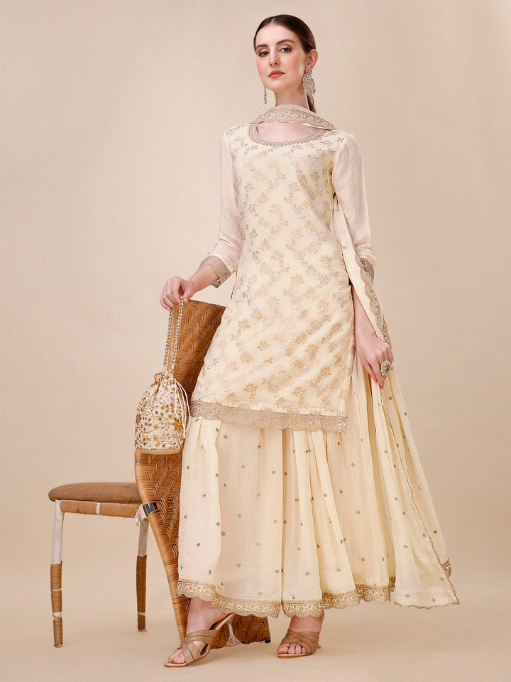 Off-White Chinon Kurta. Paired with Chinon Sharara Bottom and Chinon Dupatta