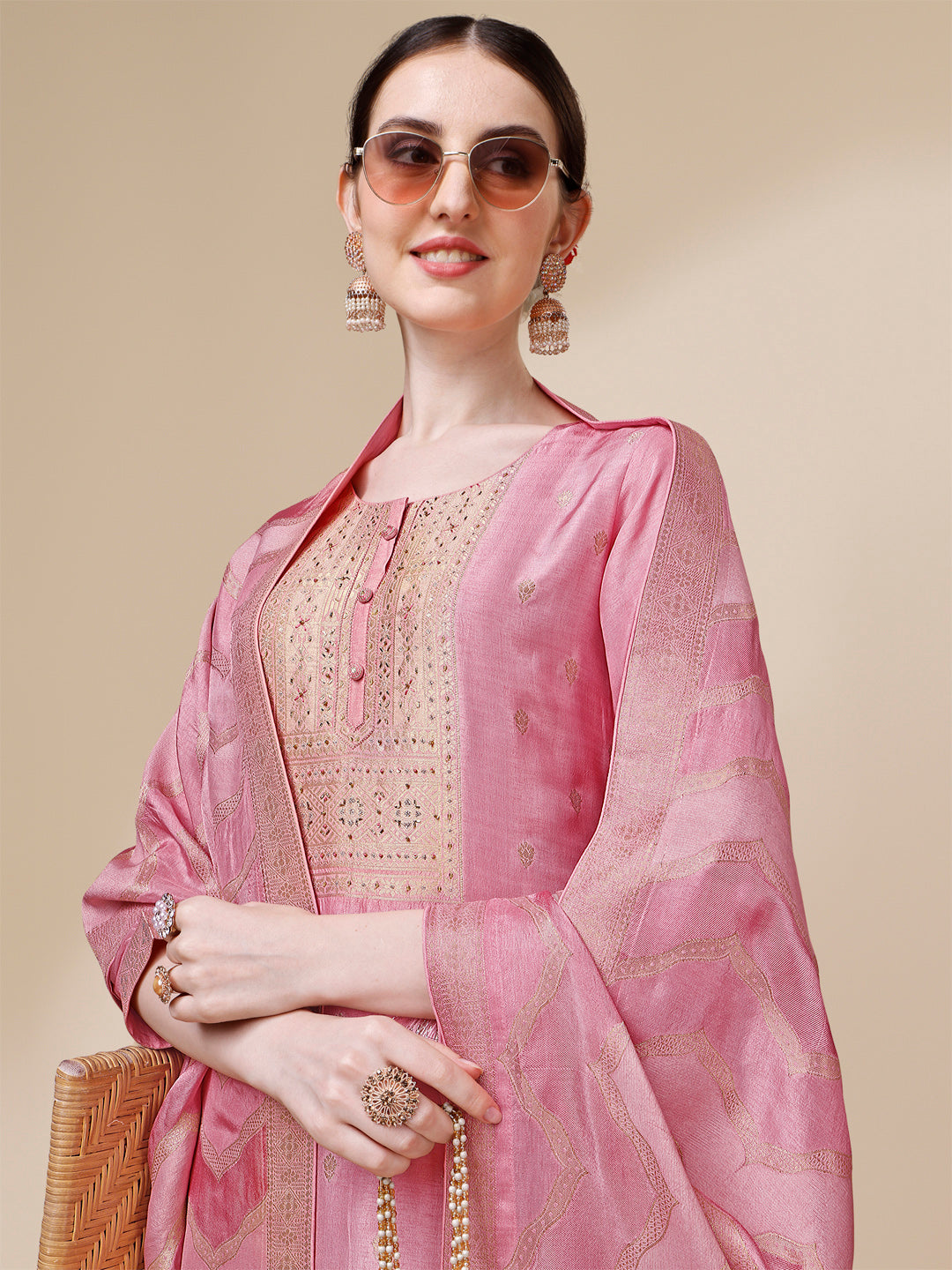 Creamy Pink Viscose Dola Silk Jacquard Kurta . Paired with Santoon Trouser and Viscose Dola Jacquard Dupatta