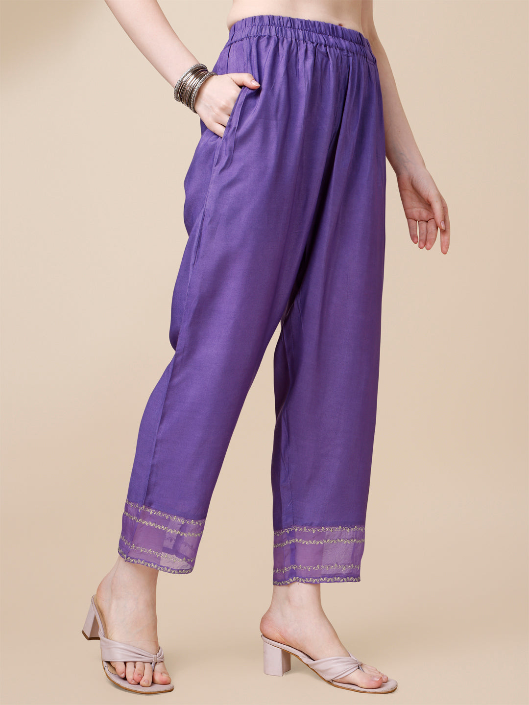 Voilet Viscose Dola Silk Jacquard Kurta. Paired with Santoon Trouser and Organza Dupatta