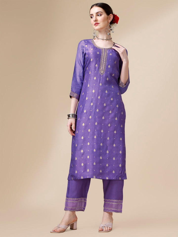 Voilet Viscose Dola Silk Jacquard Kurta. Paired with Santoon Trouser and Organza Dupatta