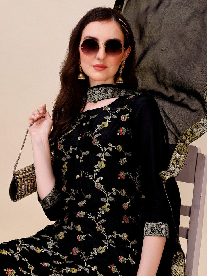 Black Dola Silk Jacquard Kurta . Paired with Santoon Trouser and Chinon Dupatta