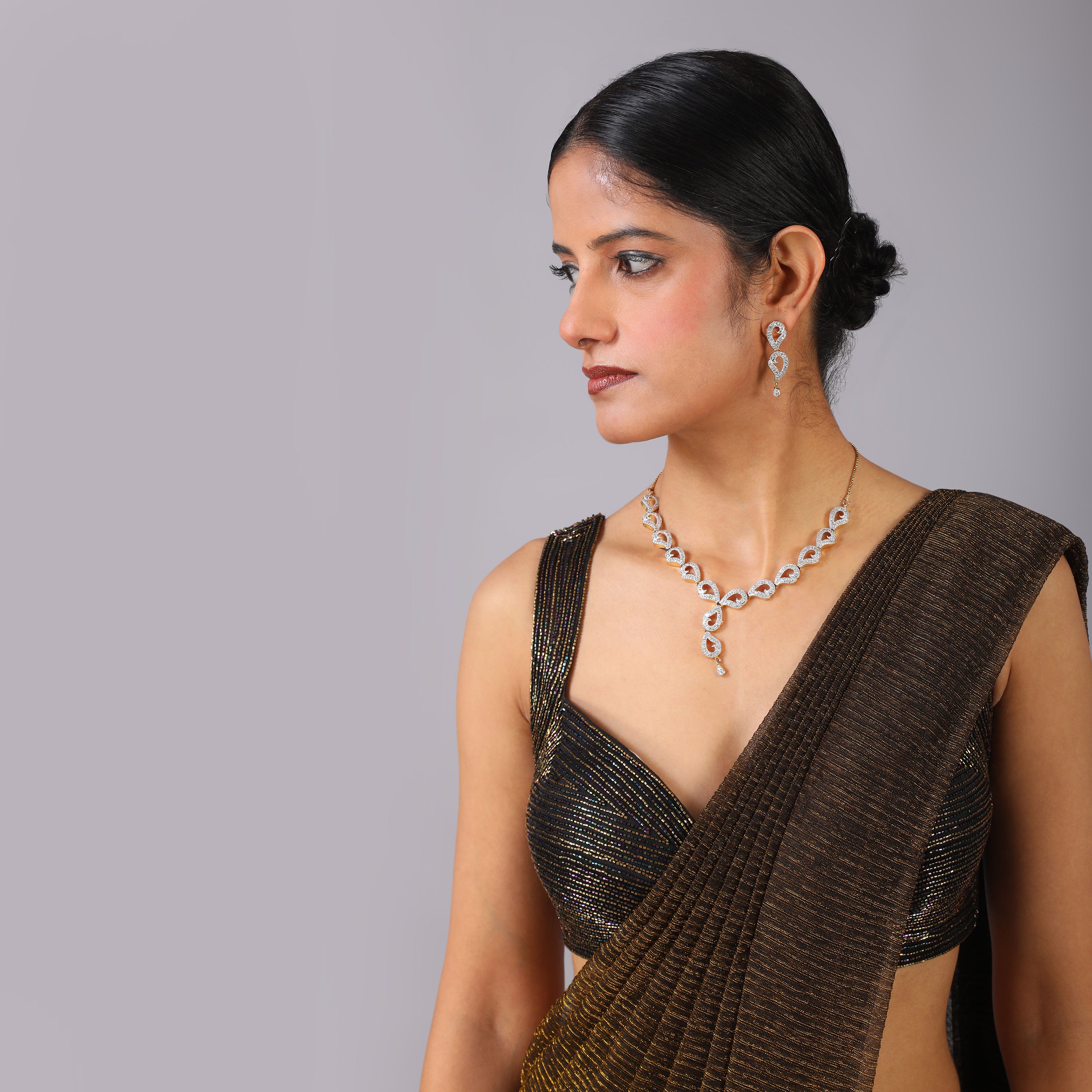 Shimmering Bronze Metallic Pre-draped Saree with geomatrical pattern hand embroidered blouse - qivii