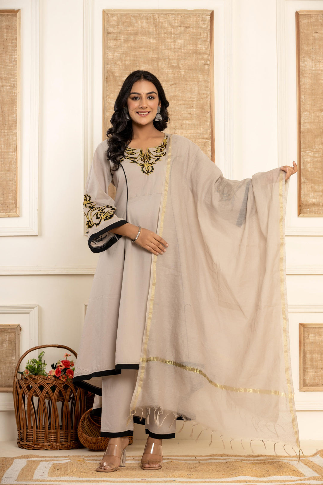  Full view of the kurta set on a mannequin, showcasing the elegant and stylish ensemble