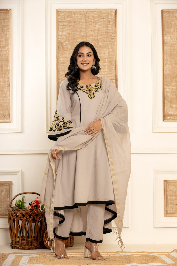 Beautiful grey kurta set with intricate embroidery by Ragavi, perfect for any occasion