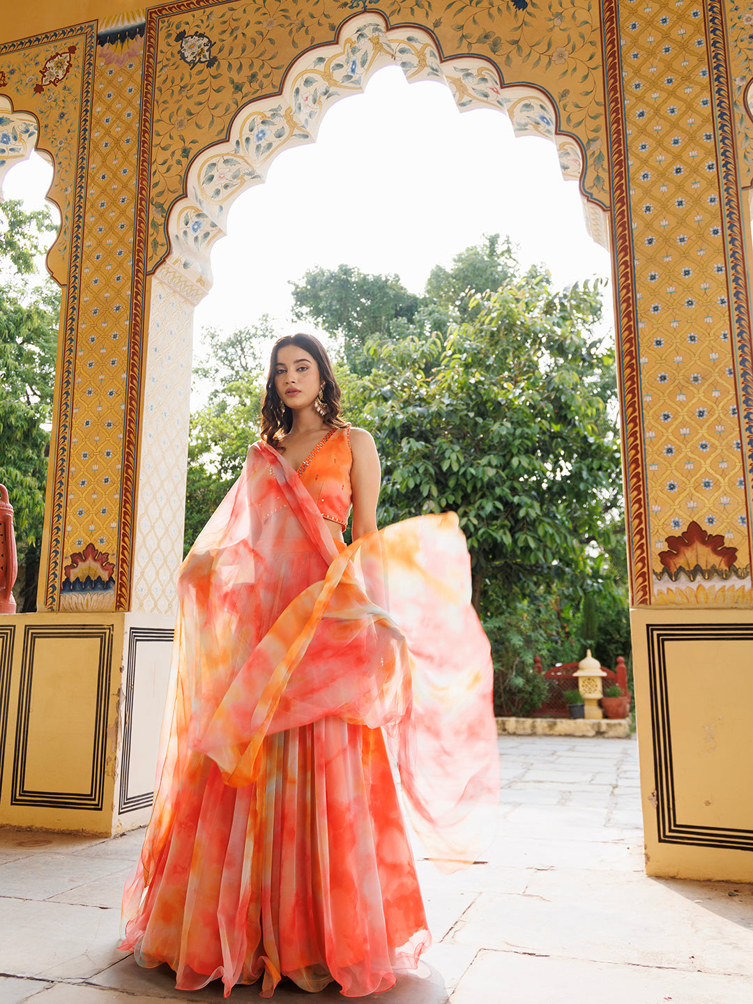   Full view of the lehenga set featuring a matching dupatta with border  