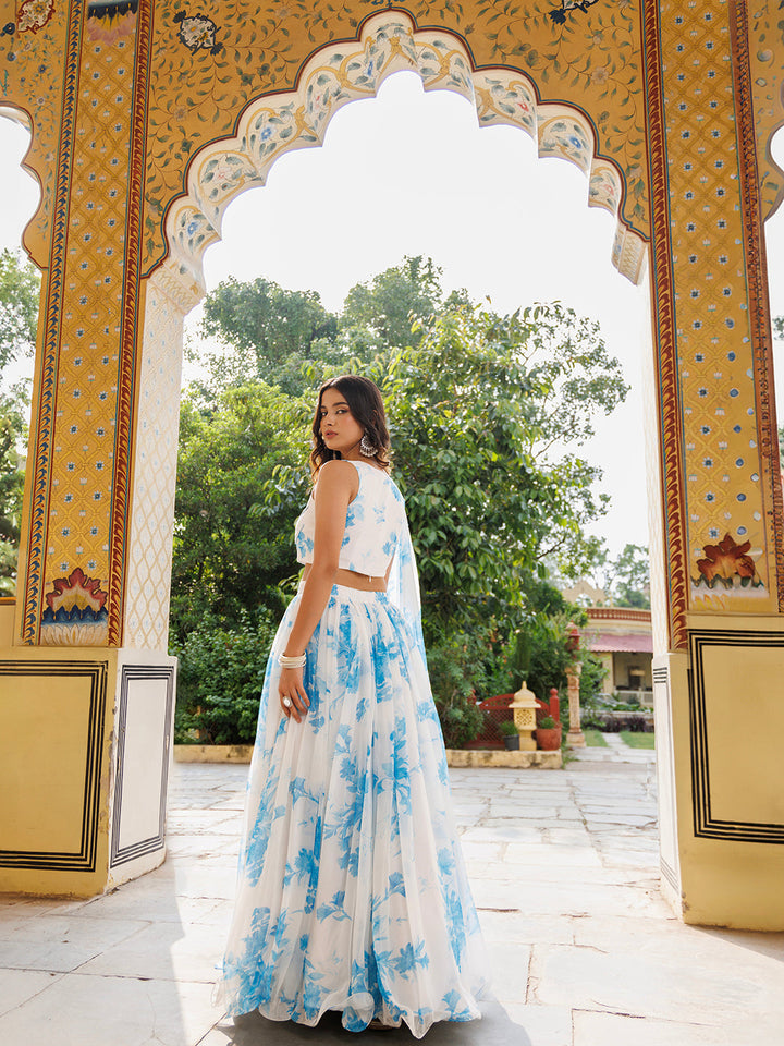 Hawaiian White Blue Floral Printed Chiffon Lehenga Set - By Ragavi - A beautiful and elegant traditional Indian outfit with a white and blue floral print on a flowing chiffon fabric, perfect for special occasions and celebrations