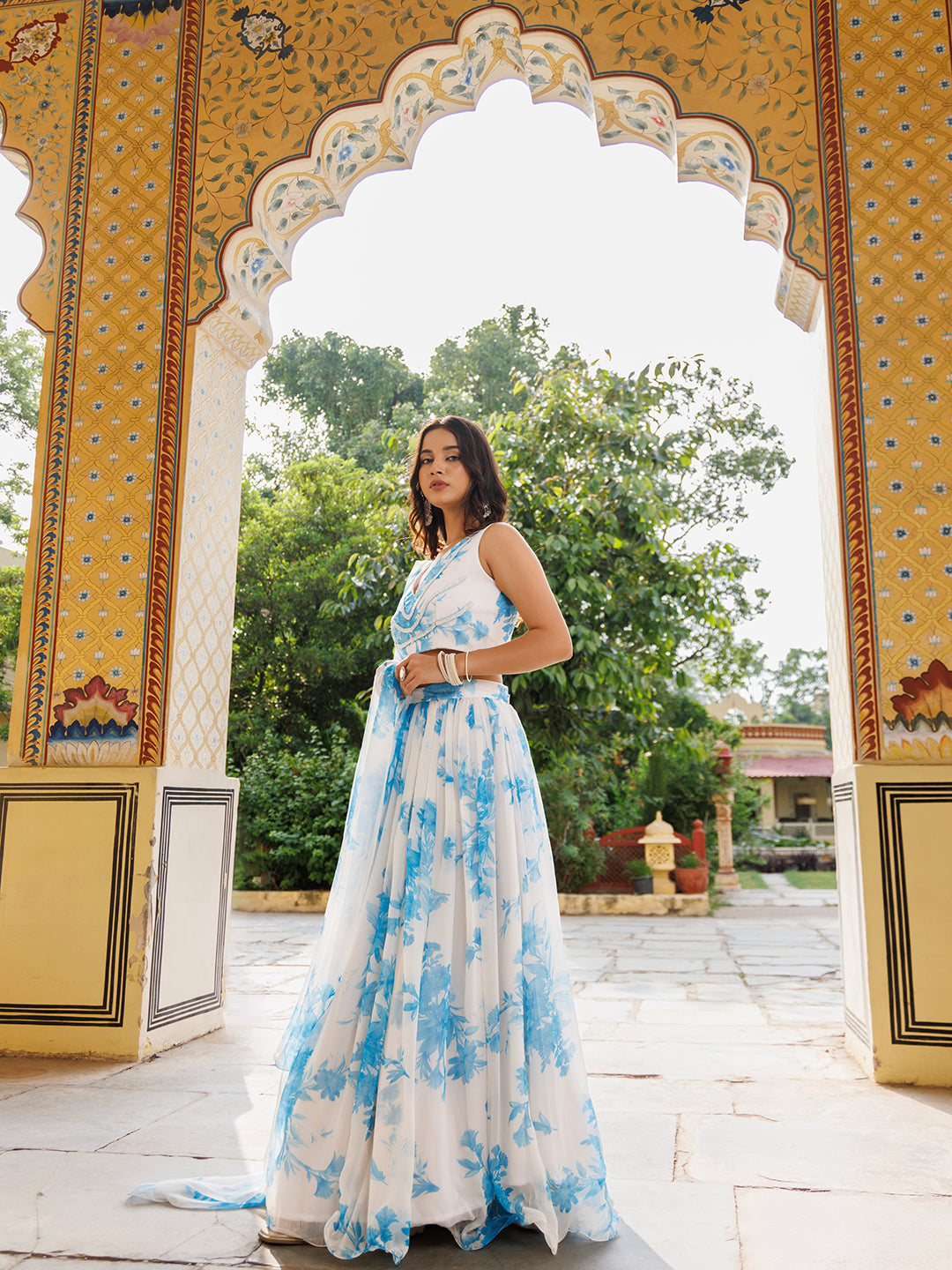 Hawaiian White Blue Floral Printed Chiffon Lehenga Set - By Ragavi, a stunning ensemble featuring a beautiful floral pattern in soft, flowing chiffon fabric for a breezy and elegant look