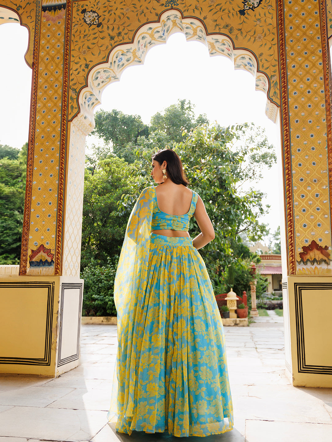 Aqua Bay Blue Yellow Floral Printed Chiffon Lehenga Set designed by Ragavi, perfect for summer weddings and special occasions