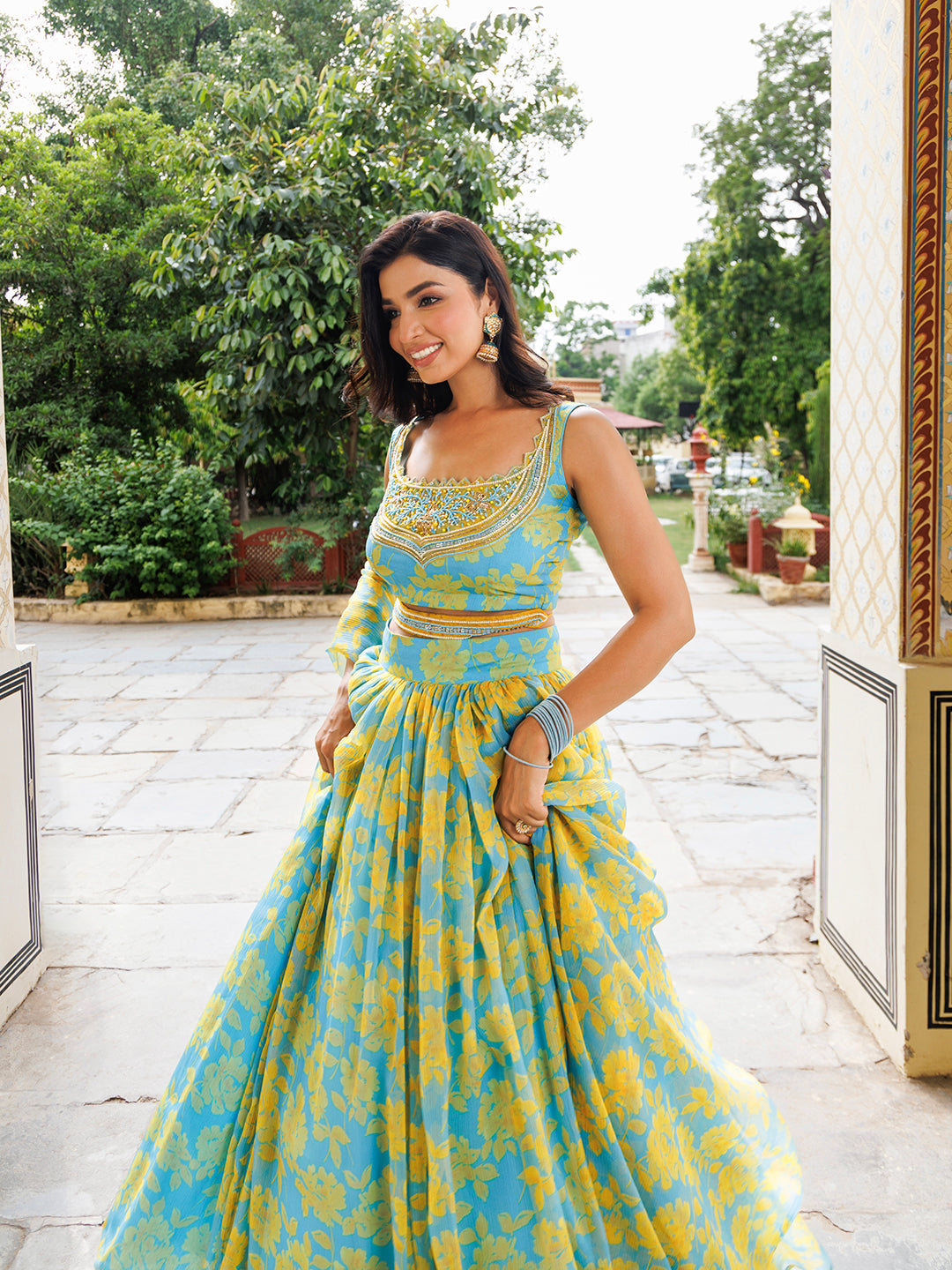 Aqua Bay Blue Yellow Floral Printed Chiffon Lehenga Set by Ragavi - elegant and vibrant traditional Indian outfit made with high-quality materials and intricate designs