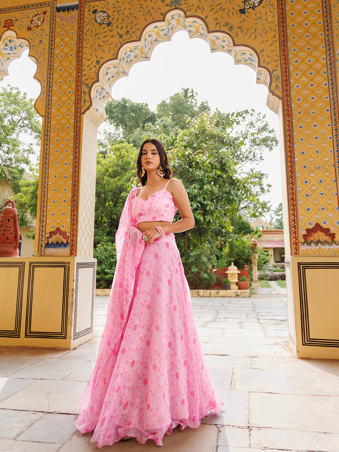 Gorgeous pink chiffon lehenga set with delicate floral patterns