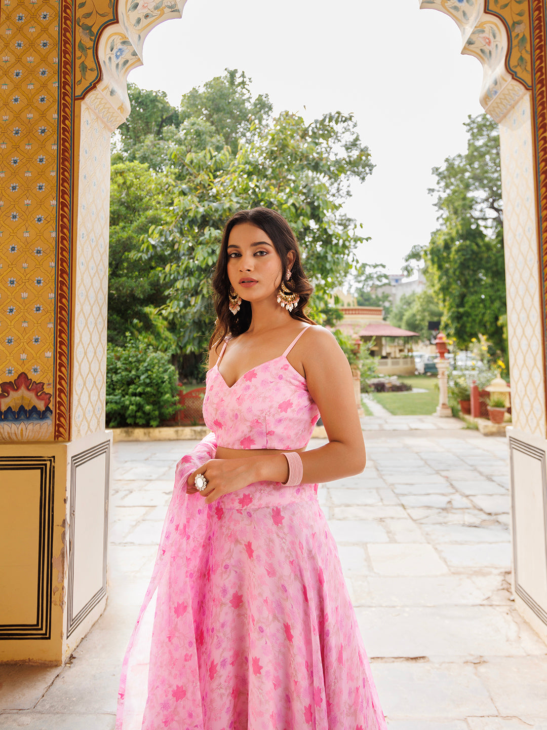 Beautiful pink floral printed chiffon lehenga set by Ragavi