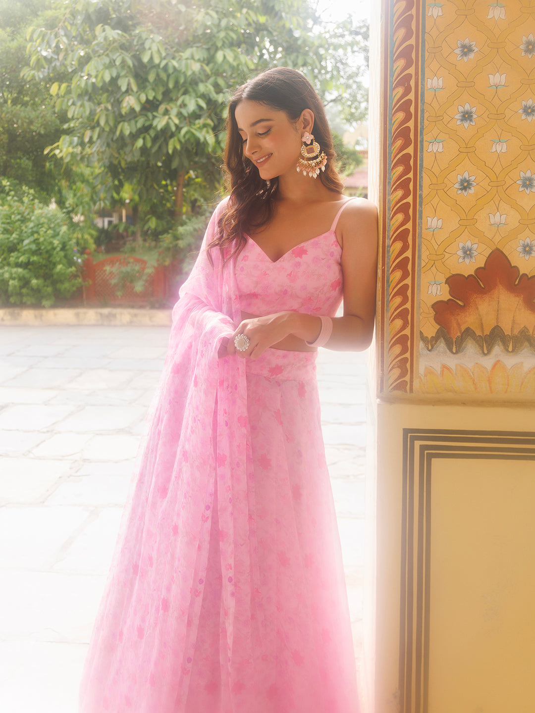 Elegant pink chiffon lehenga with delicate floral print