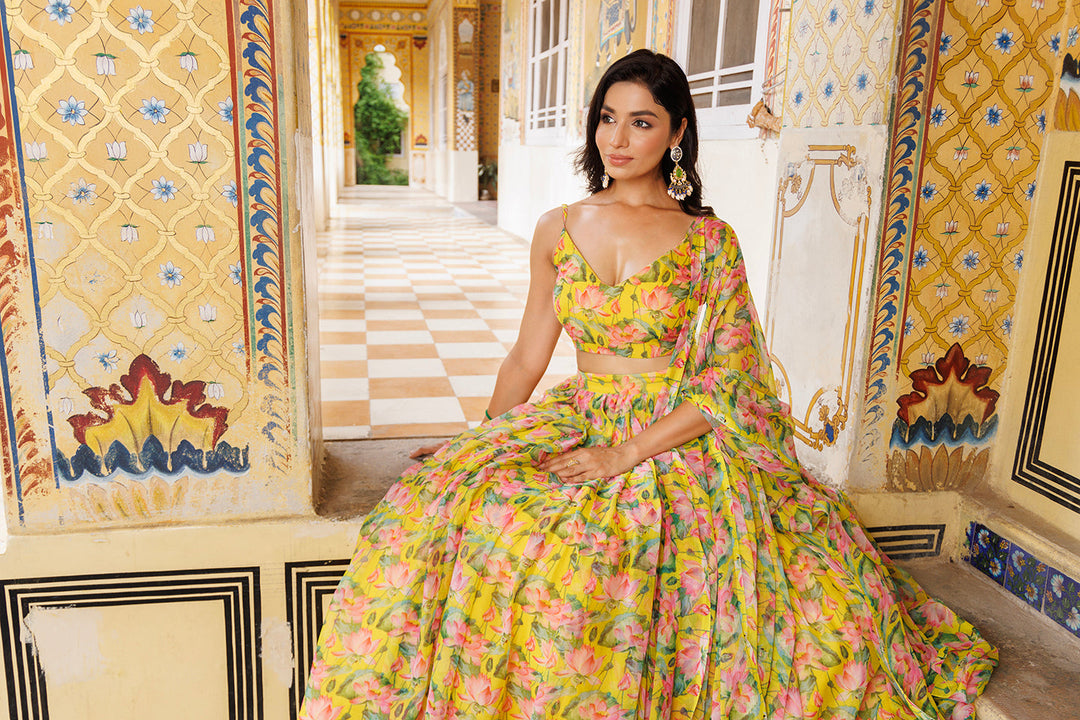 Floral printed chiffon lehenga set by Ragavi in lemon chrome yellow