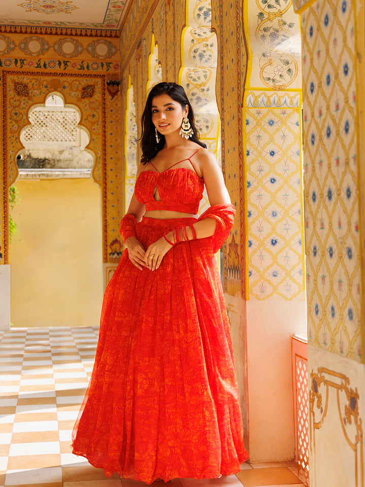 Beautiful Orangeade Red Floral Printed Chiffon Lehenga Set by Ragavi, perfect for special occasions and festivals with its vibrant colors and intricate design