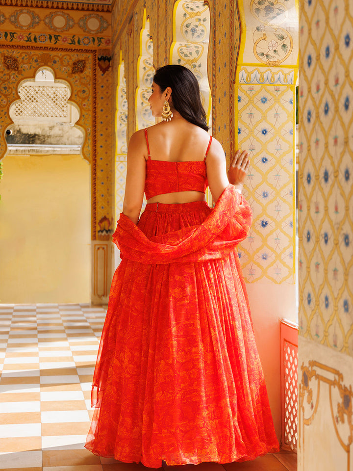 Elegant Ragavi Orange Floral Chiffon Lehenga Set with vibrant orange color and intricate floral patterns