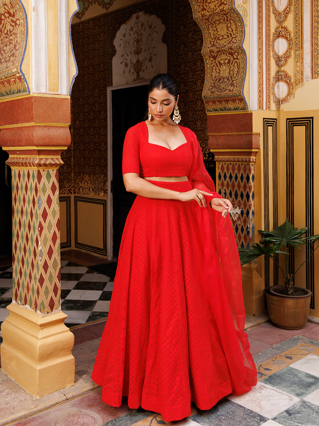 Gorgeous fire red chikankari lehenga set with intricate hand embroidery