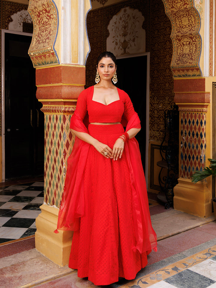 Eye-catching fire red chikankari lehenga set with intricate hand embroidery