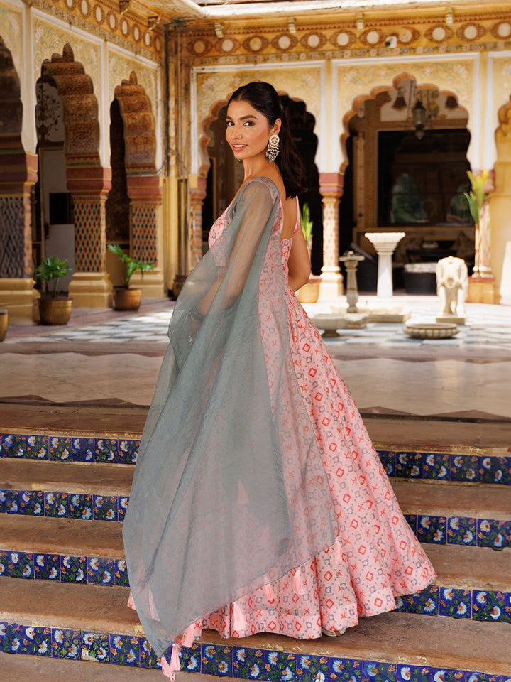 Elegant seashell pink and grey Chanderi lehenga set with traditional motifs