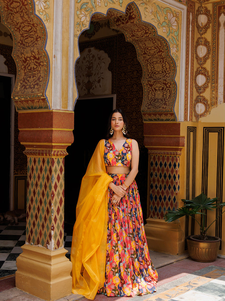 Chinon lehenga in vibrant mustard color with elegant floral patterns