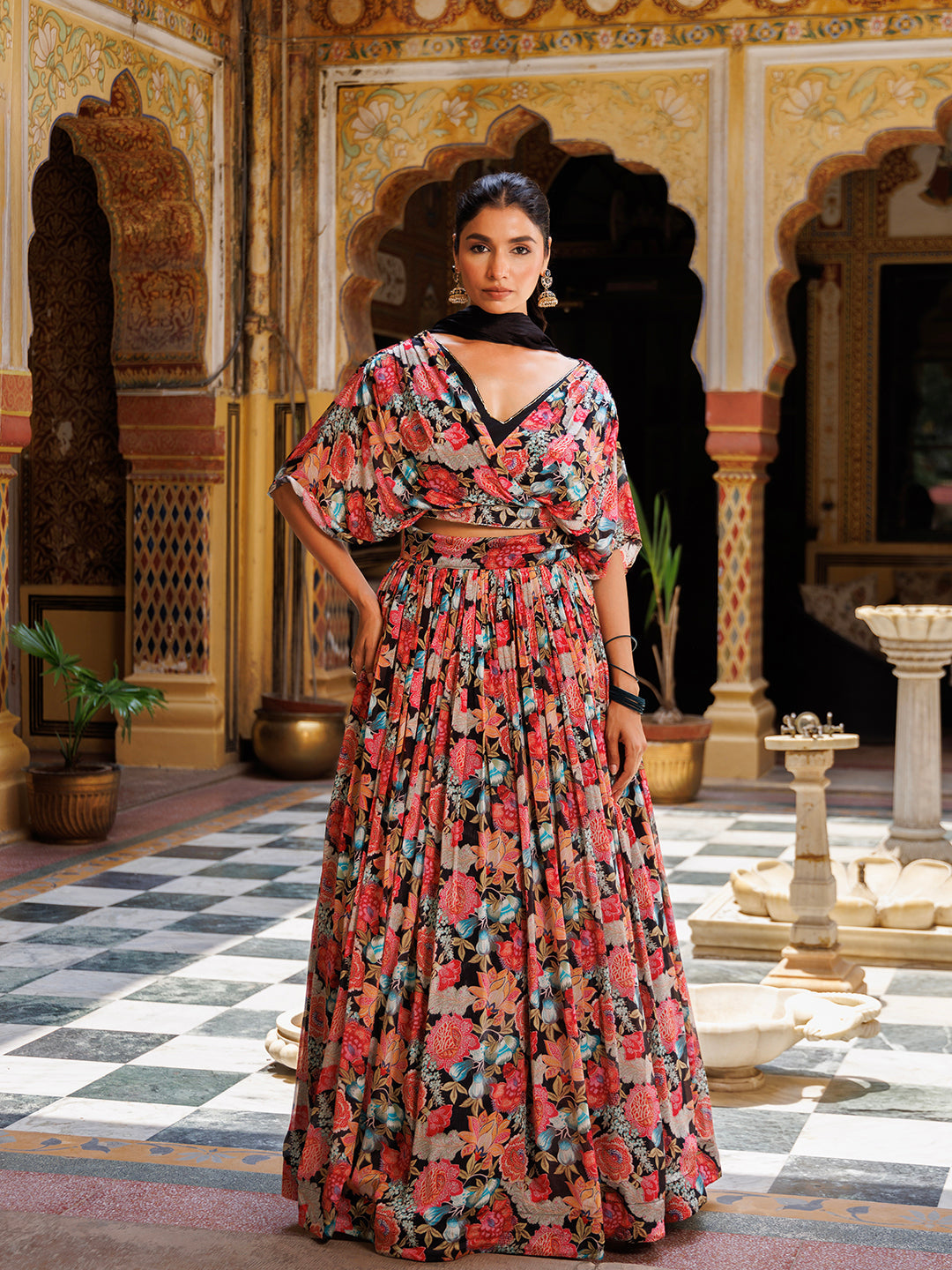 Beautiful black floral printed Chinon lehenga by Ragavi, perfect for special occasions