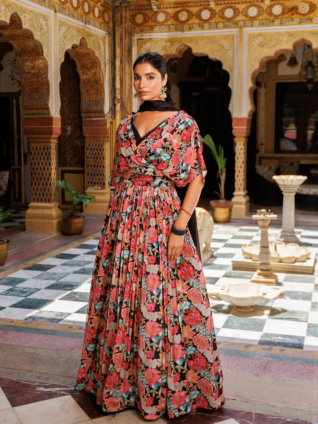 Beautiful black floral printed Chinon lehenga designed by Ragavi, perfect for special occasions