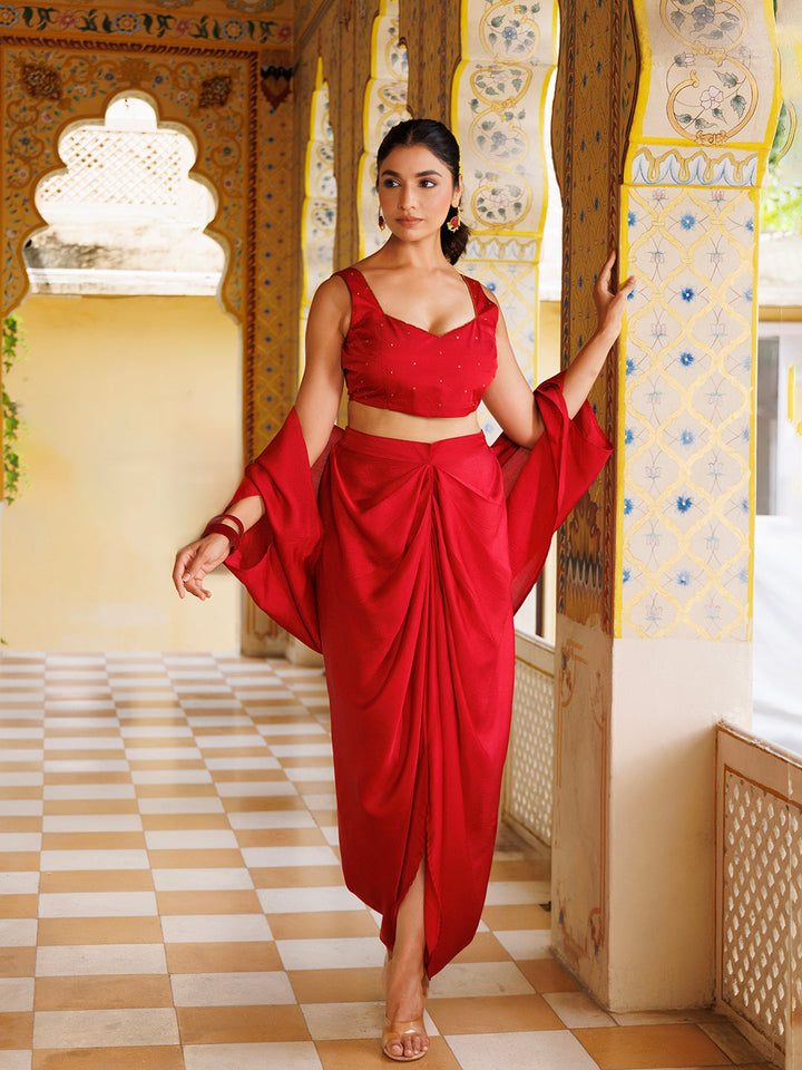 A sophisticated and elegant two-piece silk co-ord set in a stunning red color by Ragavi