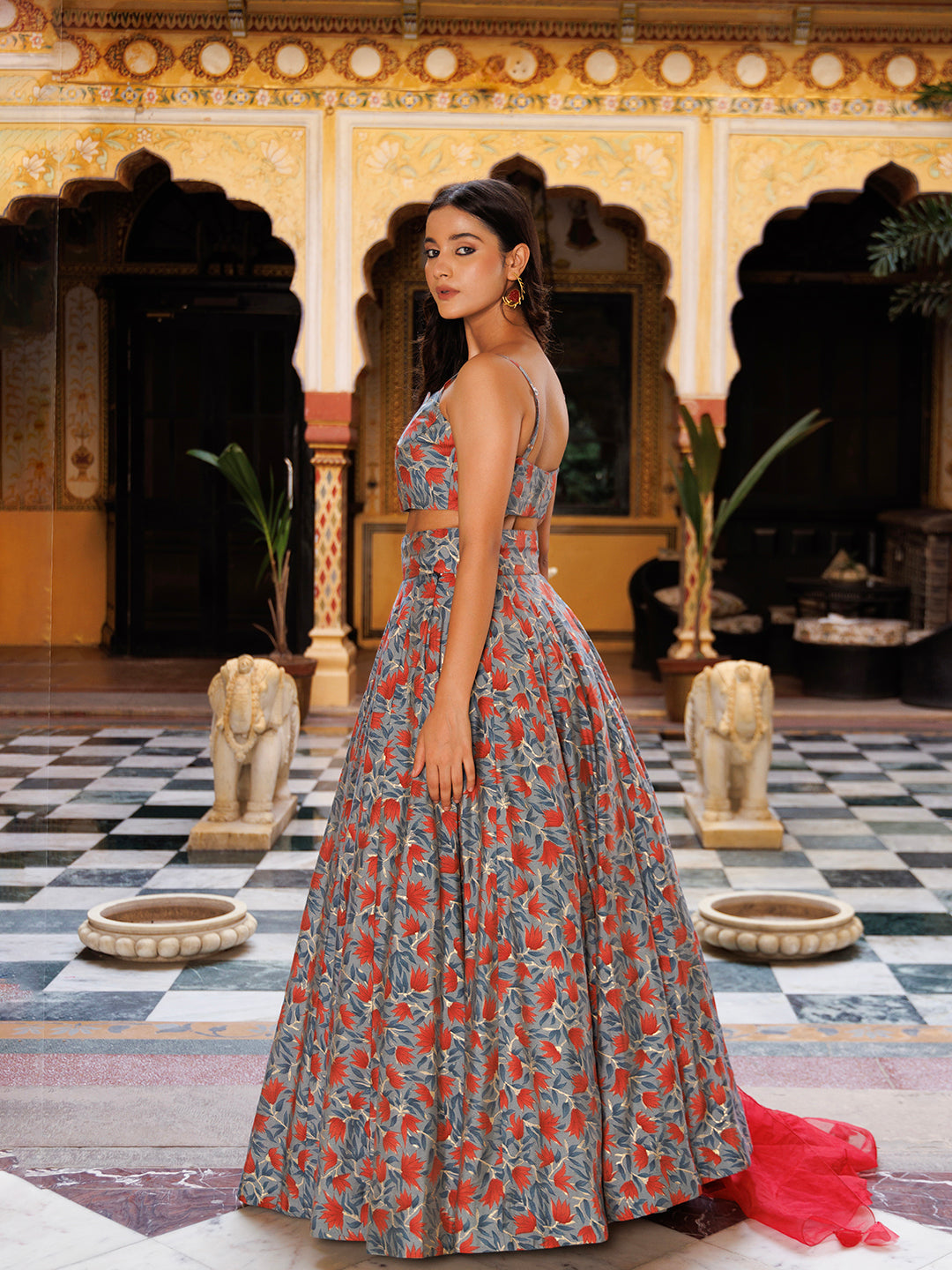  Titanium Grey Red Chanderi Lehenga Set - By Ragavi lehenga set displayed alongside matching jewelry and footwear, perfect for a traditional occasion