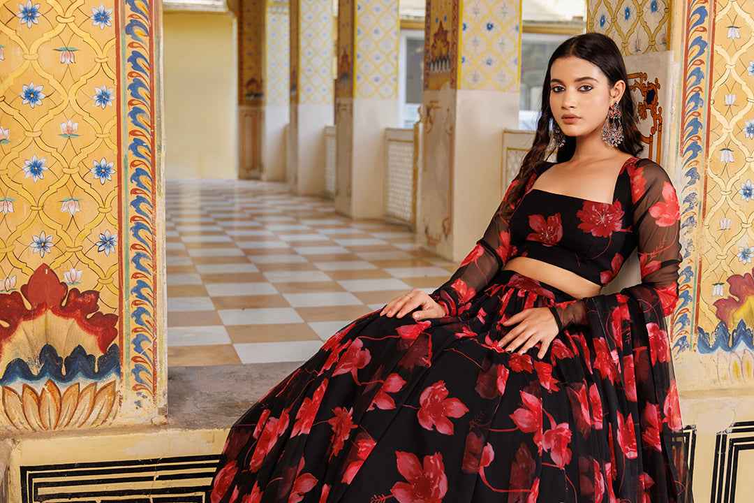 Scarlett Rose Black And Red Floral Printed Chiffon Lehenga Set - By Ragavi, a stunning traditional Indian outfit with intricate floral designs in bold red and black colors