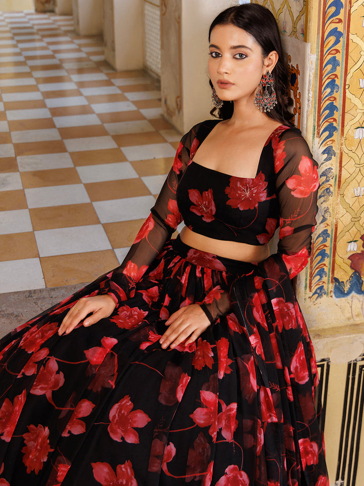 Scarlett Rose Black And Red Floral Printed Chiffon Lehenga Set - By Ragavi featuring vibrant red and black floral patterns on flowing chiffon fabric