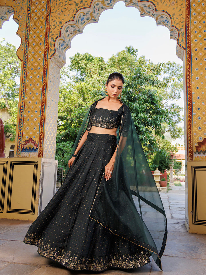  Stunning Colonial Green Gold Foil Printed Silk Lehenga Set by Ragavi featuring a matching blouse with intricate design