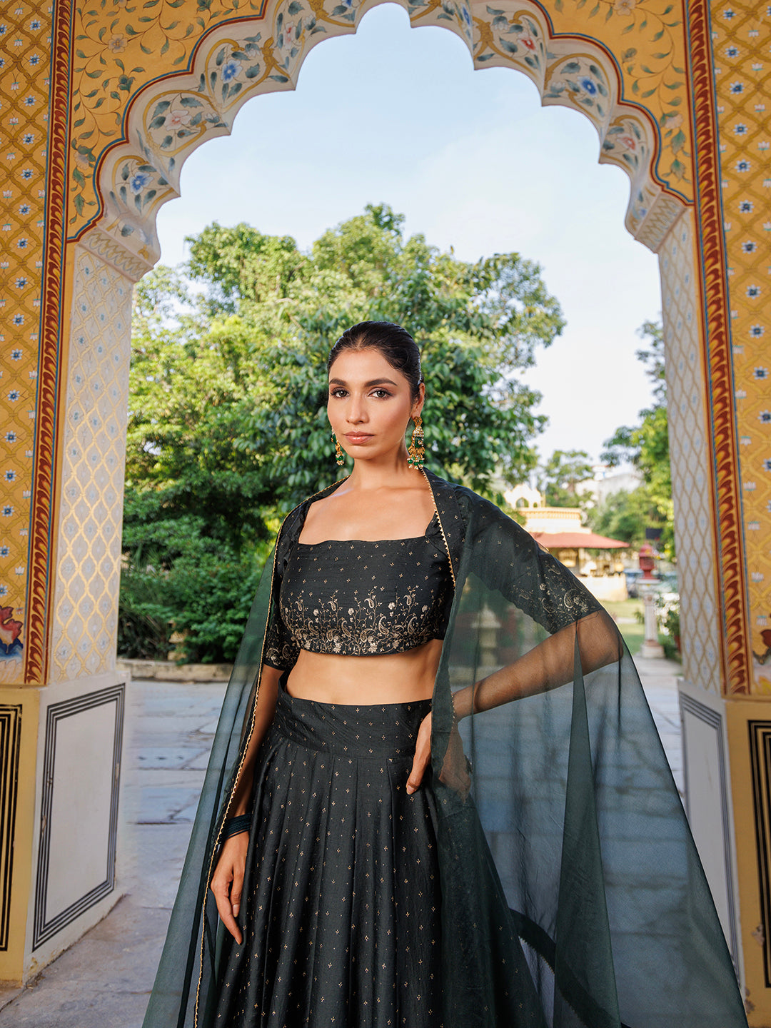 Beautiful colonial green and gold silk lehenga set with intricate embroidery