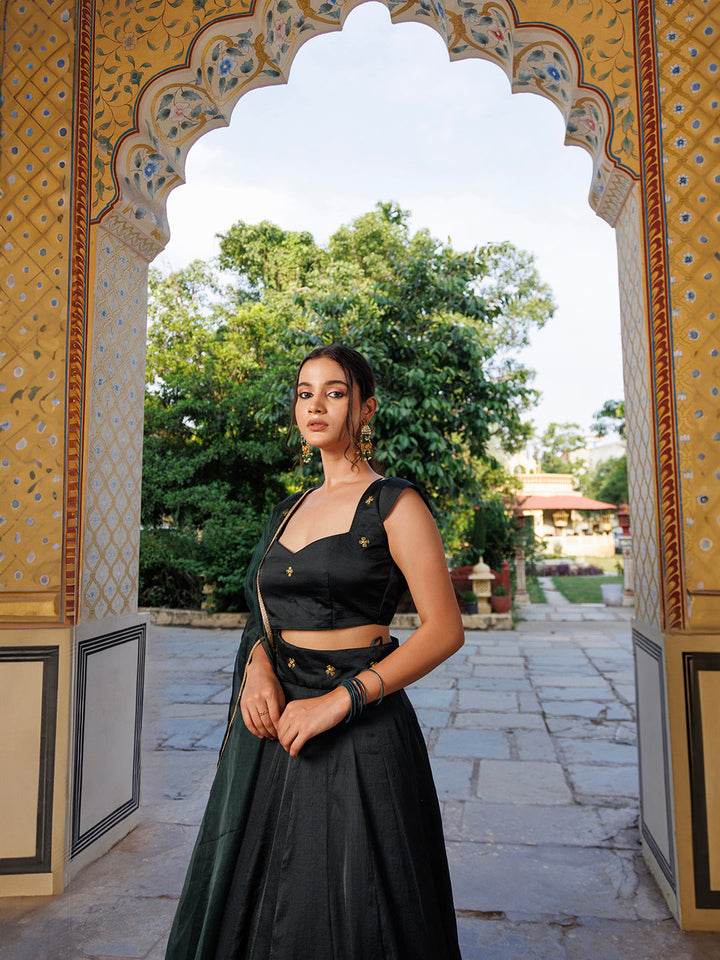  Detailed shot of the intricate gold embroidery on the blouse of the Green Bay Embroidered Silk Lehenga Set