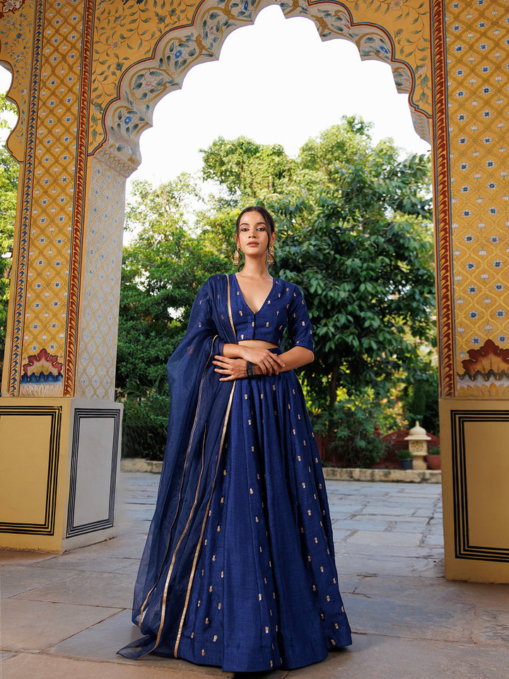 Exquisite Galactic Blue Embroidered Silk Lehenga Set by Ragavi, perfect for special occasions and weddings, featuring intricate and elegant detailing