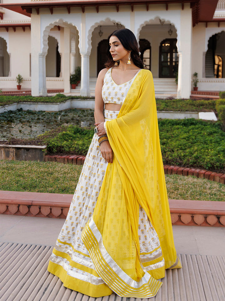 Sunstruck Yellow and White Cotton Lehenga Set BY RAGAVI