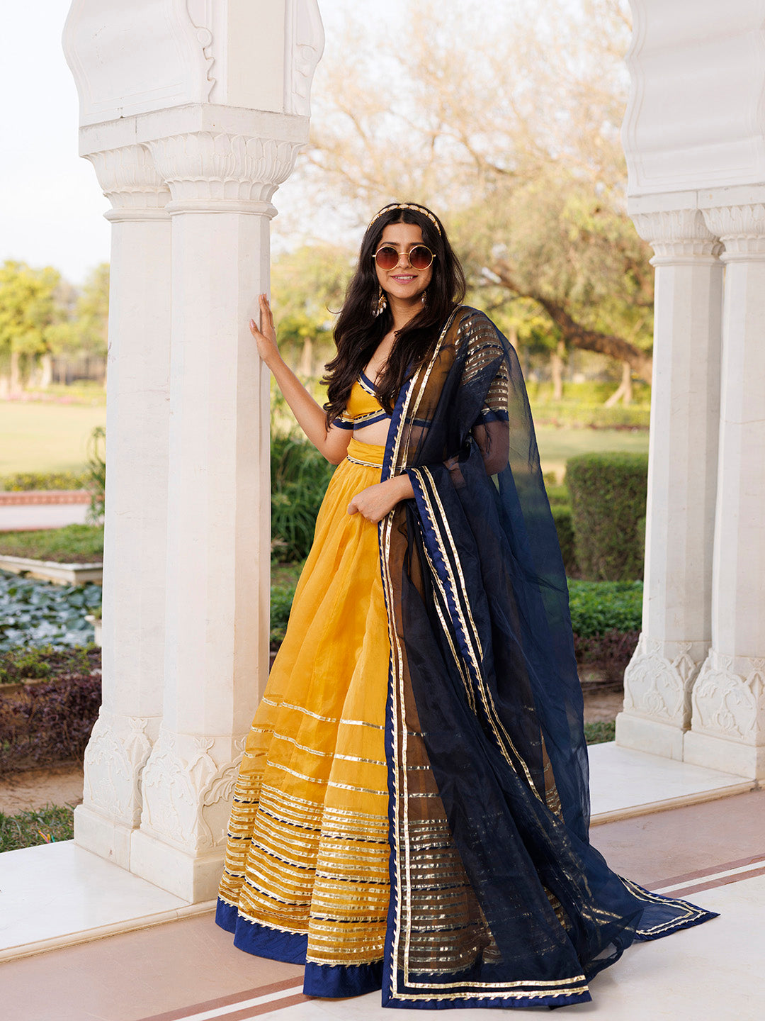 Sunset Gold Yellow and Navy Blue Lehenga Set BY RAGAVI