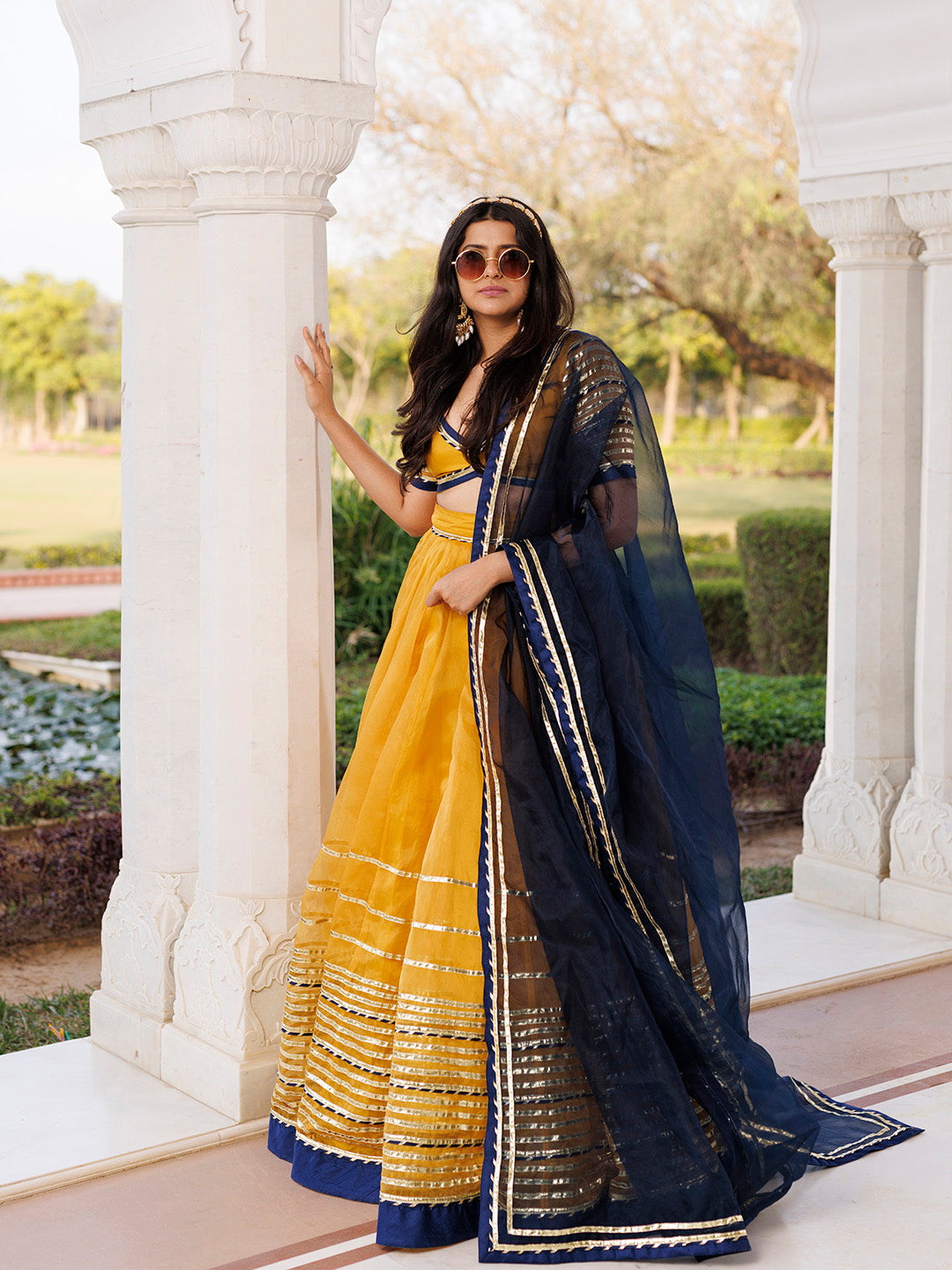 Sunset Gold Yellow and Navy Blue Lehenga Set BY RAGAVI