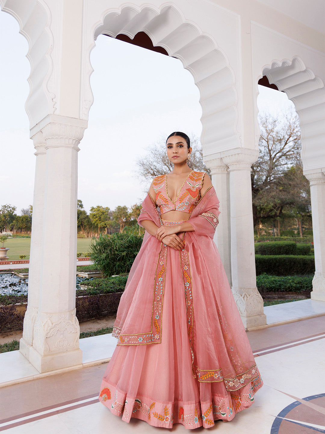 Peach Fuzz Embroidered Organza Lehenga Set BY RAGAVI