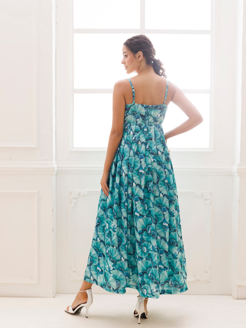 Stunning Water Garden Green Maxi Dress by Ragavi - Perfect for summer events and vacations, featuring a beautiful floral print and flowing silhouette