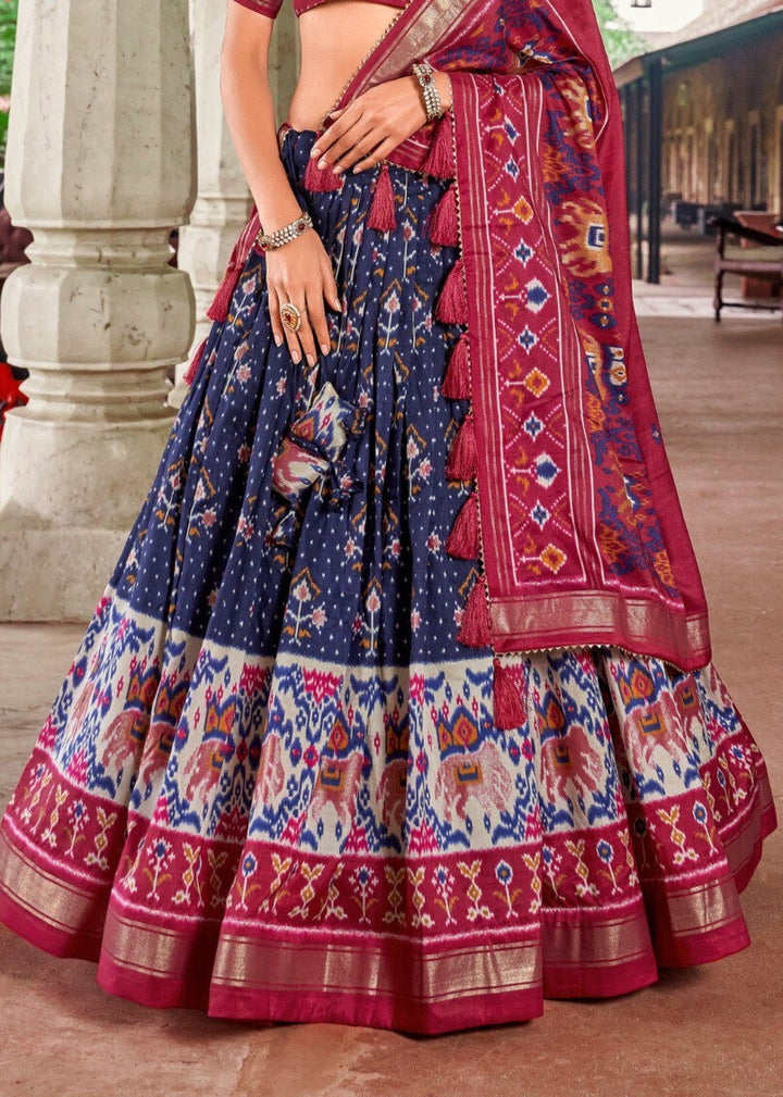 Traditional Indian attire in navy blue with intricate foil work