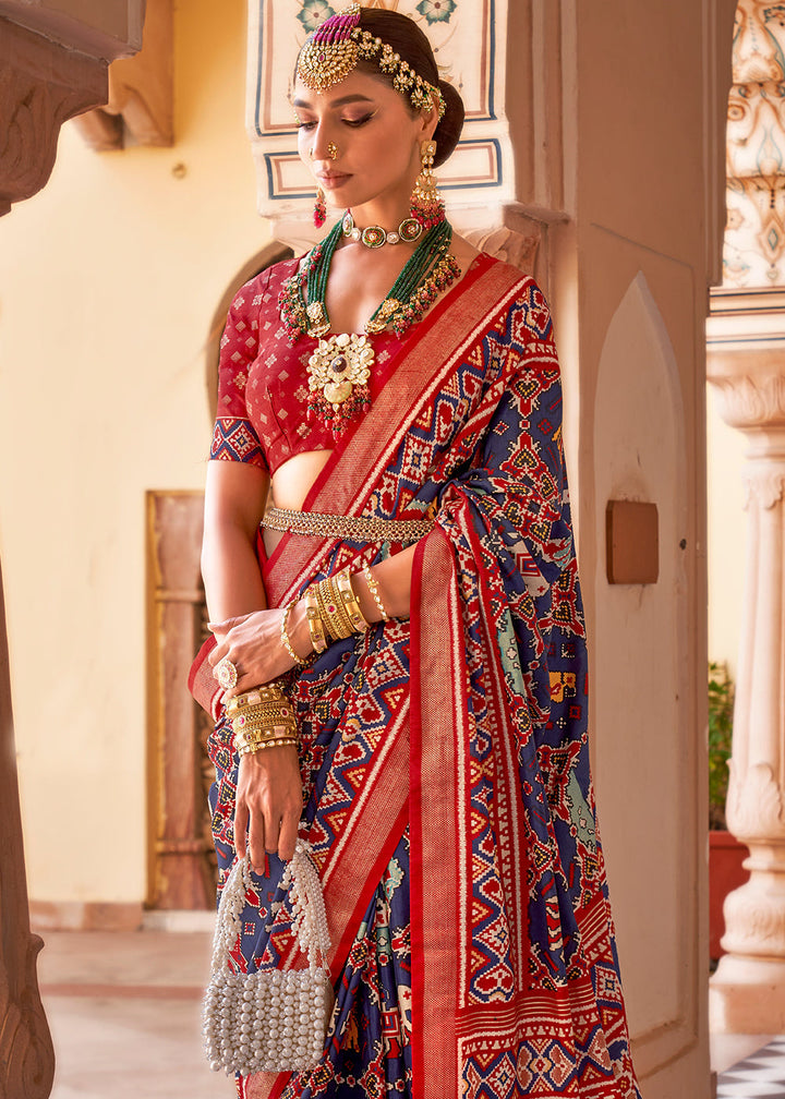 Beautiful blue and red patola silk saree with intricate printed design