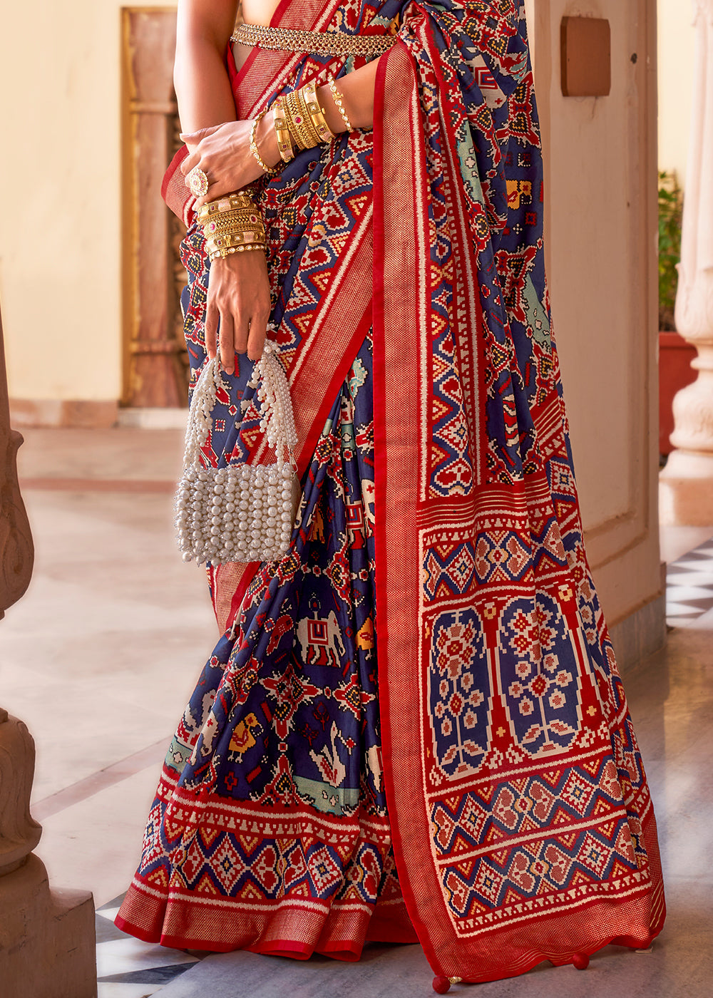 Beautiful Blue and Red Printed Patola Silk Saree with Intricate Designs