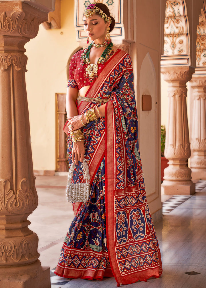 Beautiful blue and red printed Patola silk saree with intricate traditional design