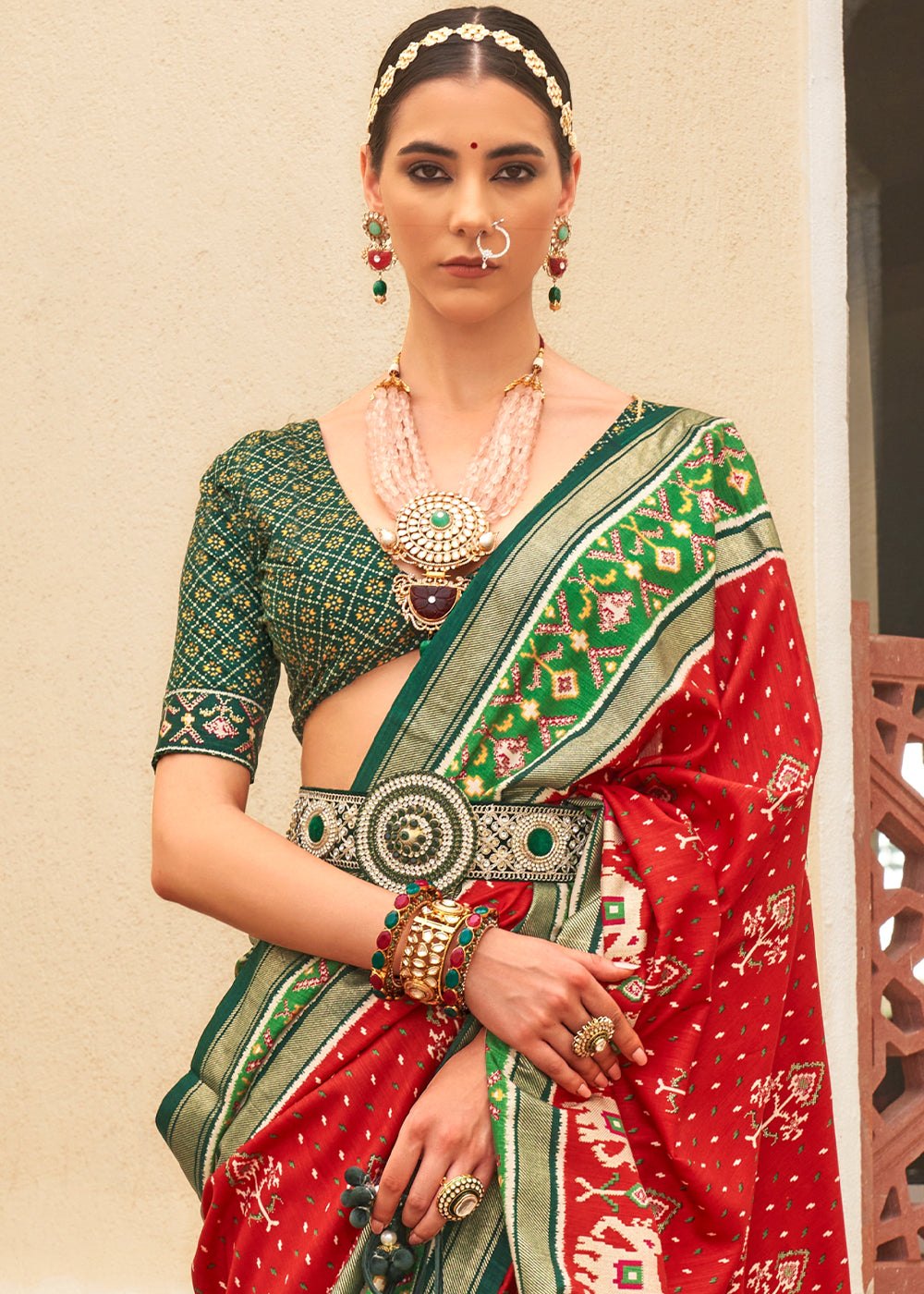 Scarlet Red & Green Printed Patola Silk Saree