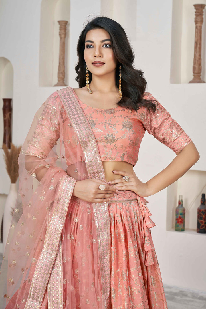 Beautiful Peach Zari Work Jacquard Reception Wear Lehenga Choli