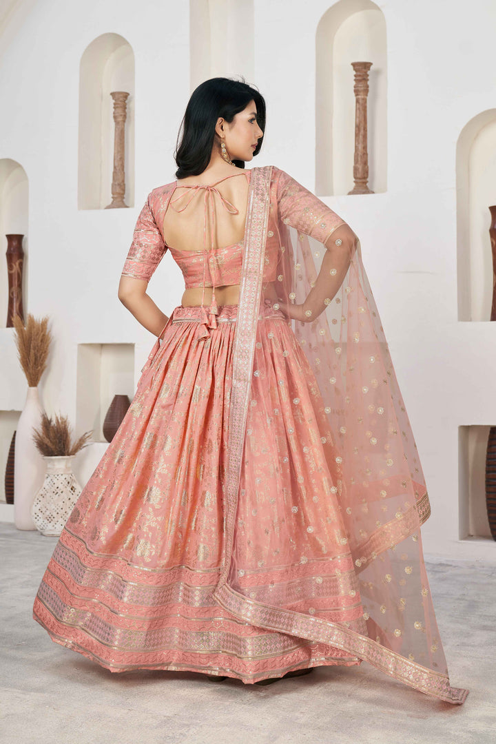 Beautiful Peach Zari Work Jacquard Reception Wear Lehenga Choli