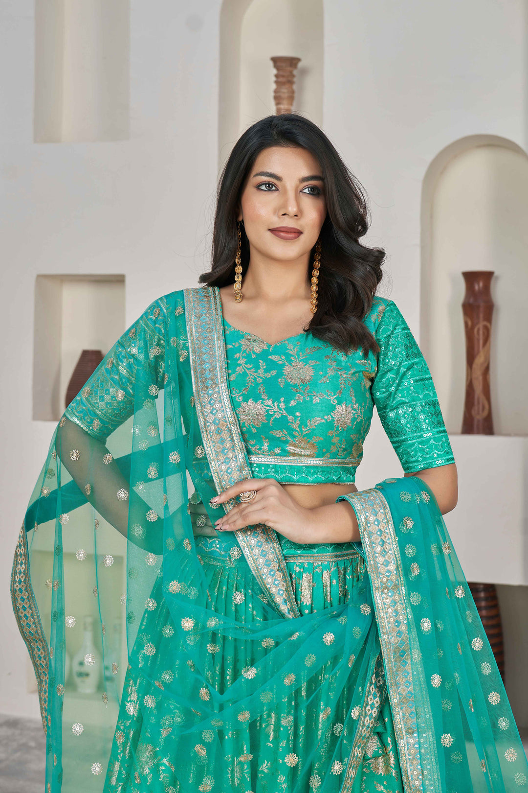 Beautiful Sea Green Zari Work Jacquard Reception Wear Lehenga Choli